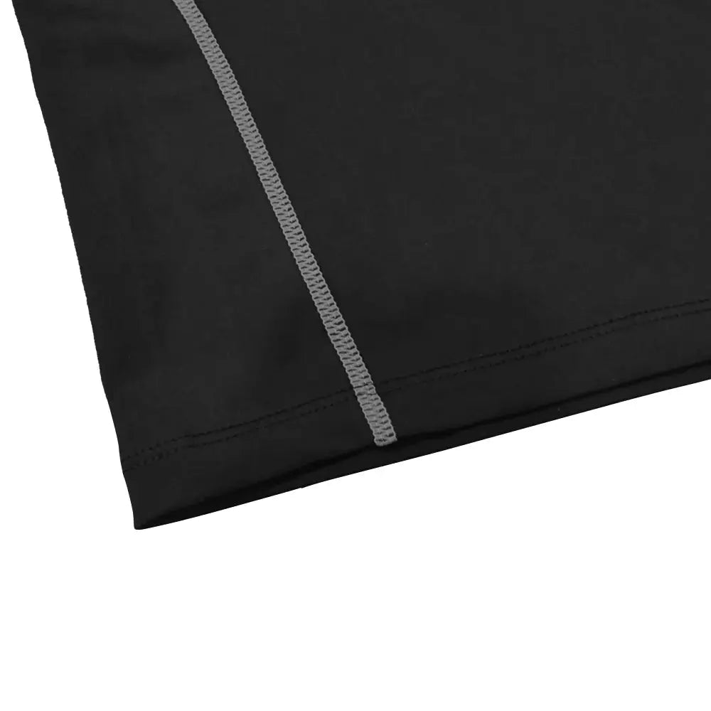 Men's black compression shirt fabric close-up with grey seam stitching