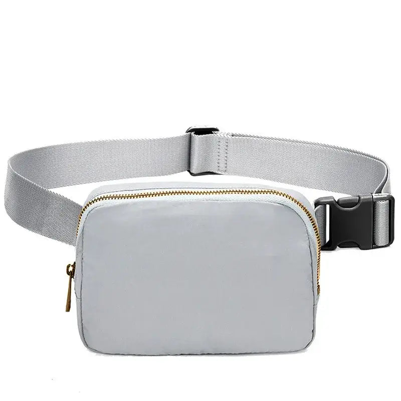 Simples Market waist bag fanny pack, light gray with gold zipper and adjustable strap.