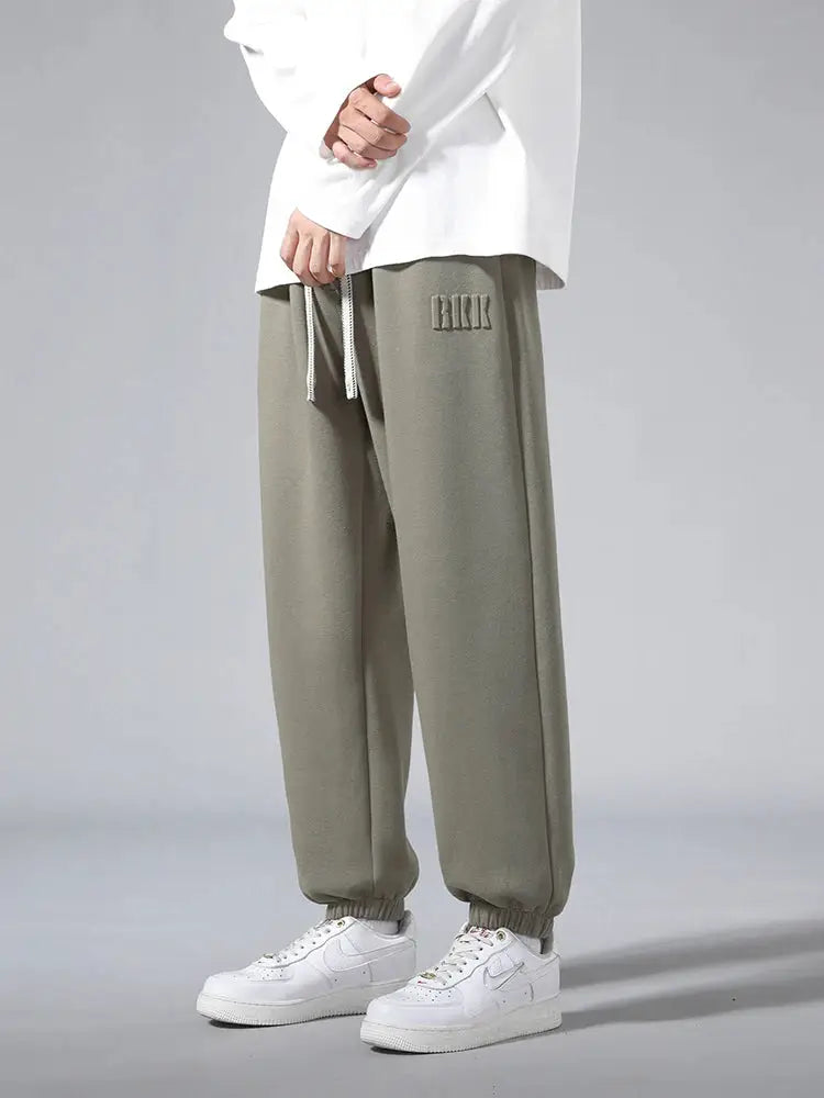 Simples Market men's olive cotton/polyester jogger pants with drawstring, cuffed ankles, baggy hip-hop style