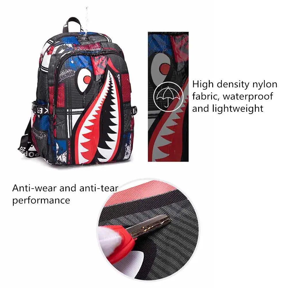 Backpack by Simples Market with cartoon shark print; blue, red and black nylon, waterproof and lightweight.
