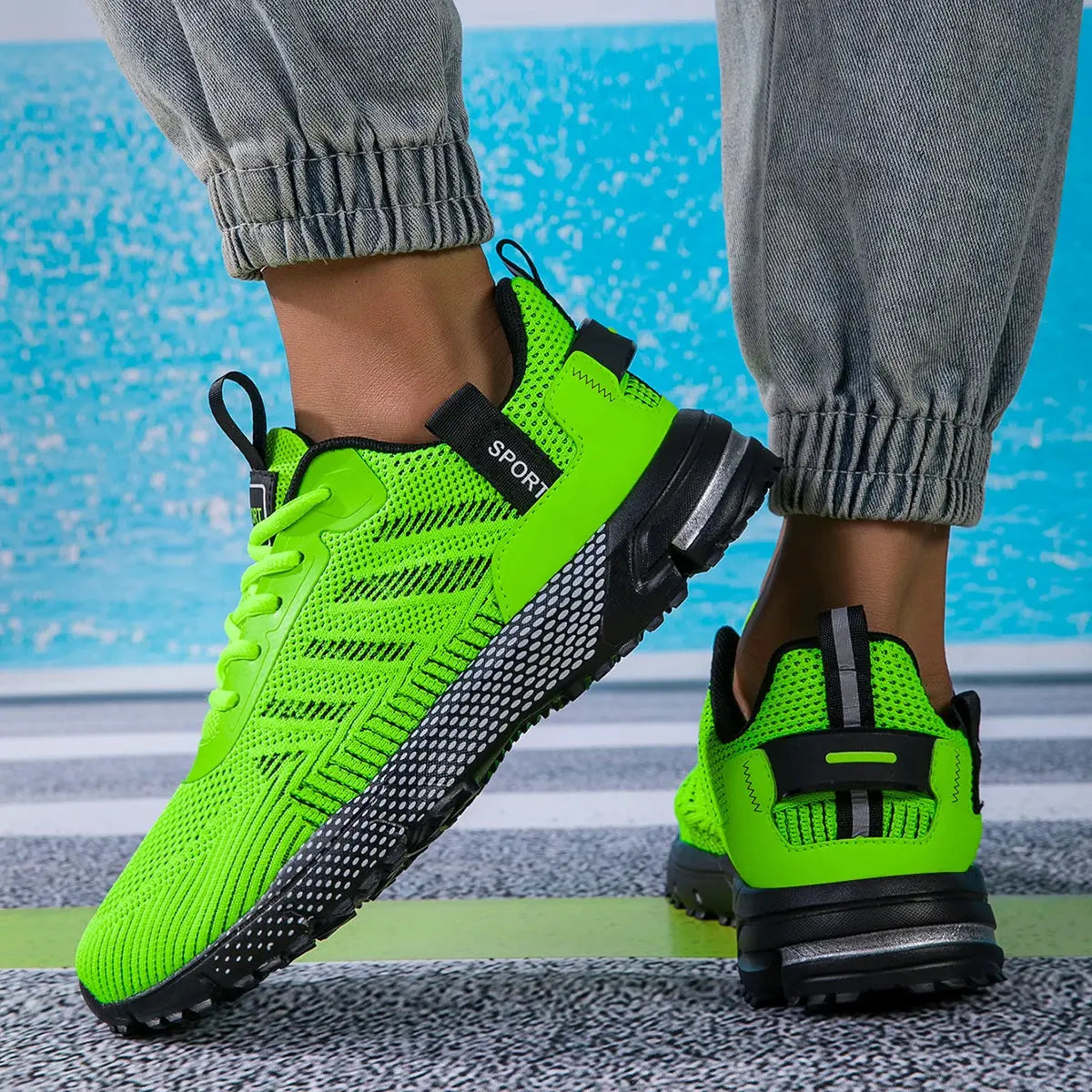 Men's running shoes neon green lace-up sneakers with breathable knit mesh and black sole.