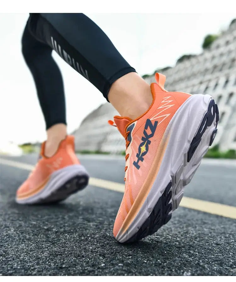 Men's orange breathable mesh running shoes with cushioned sole for workouts