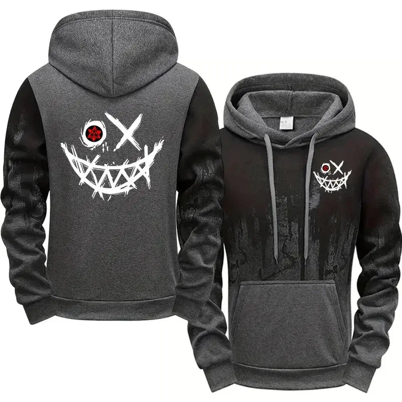 Men's tracksuit hoodie and jogger set in charcoal gray/black with white splashed-ink graphic.