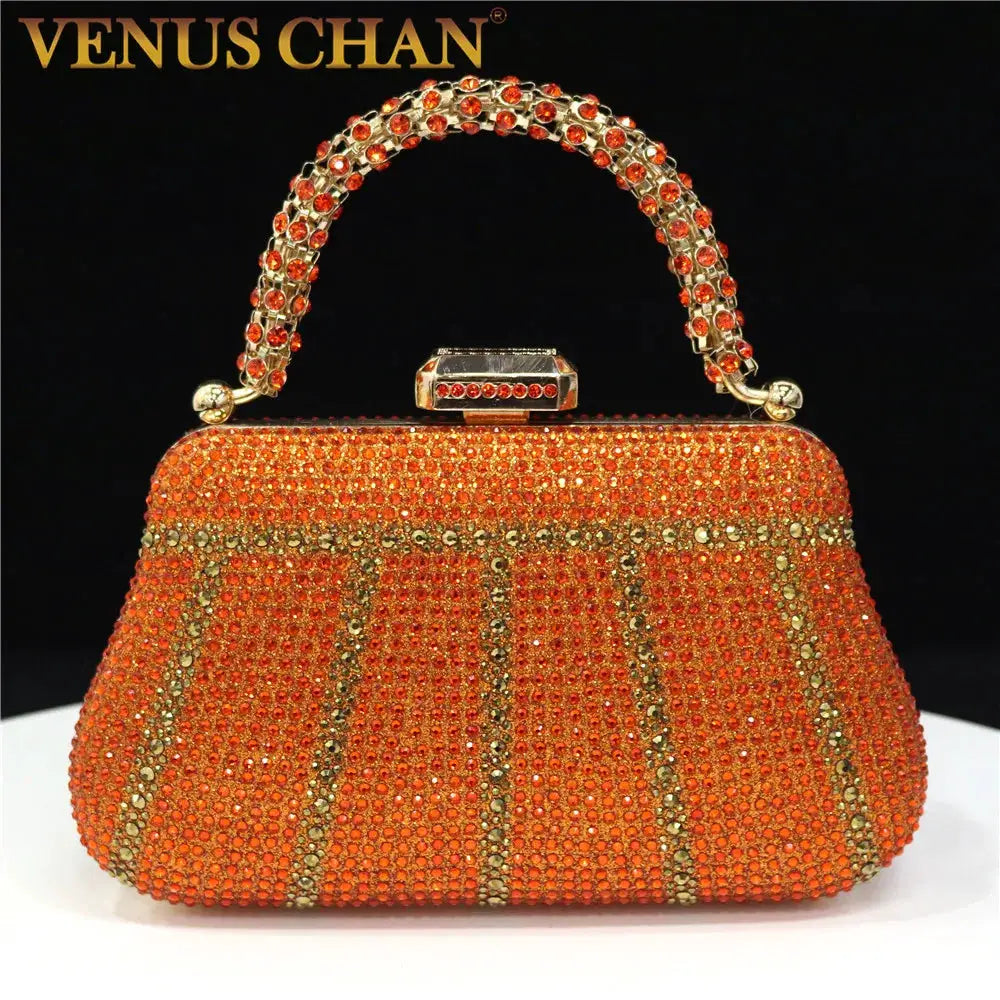 Venus Chan orange rhinestone evening clutch by Simples Market with diamond design and jeweled handle.