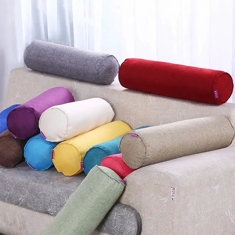 Cylindrical bolster pillow cases in assorted colors; cotton-linen fabric by Simples Market.