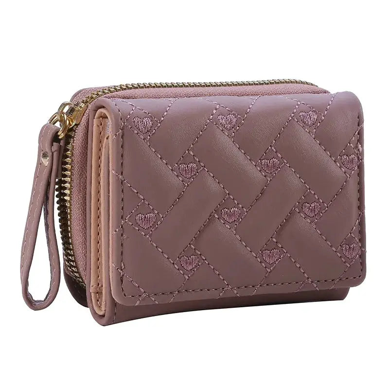 Women's pink PU leather quilted wallet with zipper closure and wrist strap