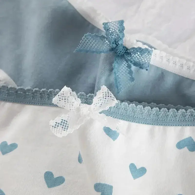 Simples Market 5pcs soft briefs for women with white fabric, blue heart print, and blue lace trim