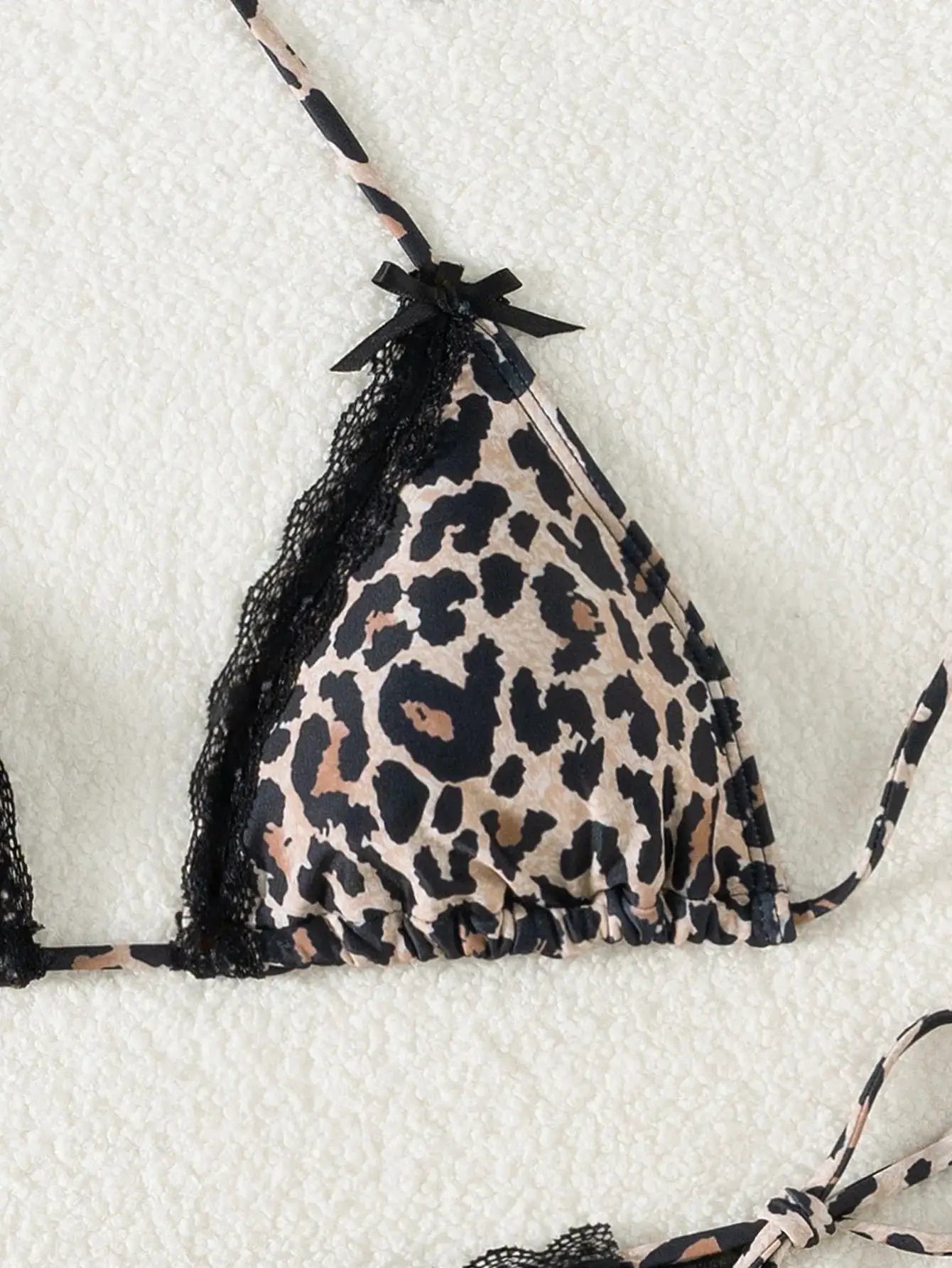 Triangle bikini top leopard print with black lace trim and adjustable ties by Simples Market