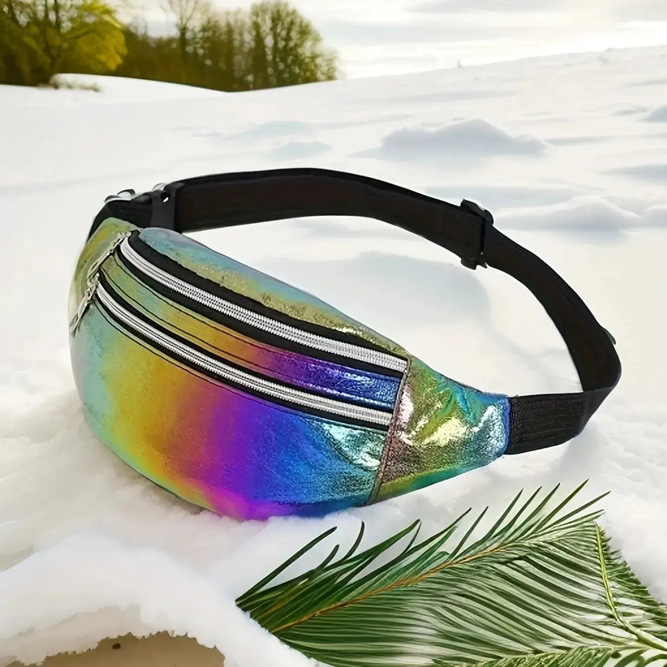 Holographic fanny pack with rainbow iridescent finish, black adjustable strap and dual zip pockets.