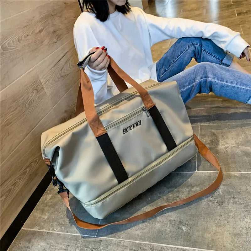 Large-capacity light gray gym bag with brown handles, black straps; BEICHAO logo on front, adjustable shoulder strap.