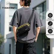 Tigernu lightweight crossbody bag for men, black with olive strap, water-resistant, multiple carry options