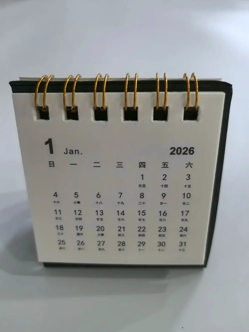 2026 Mini Simple Desk Calendar with gold coil binding and white pages, Simples Market