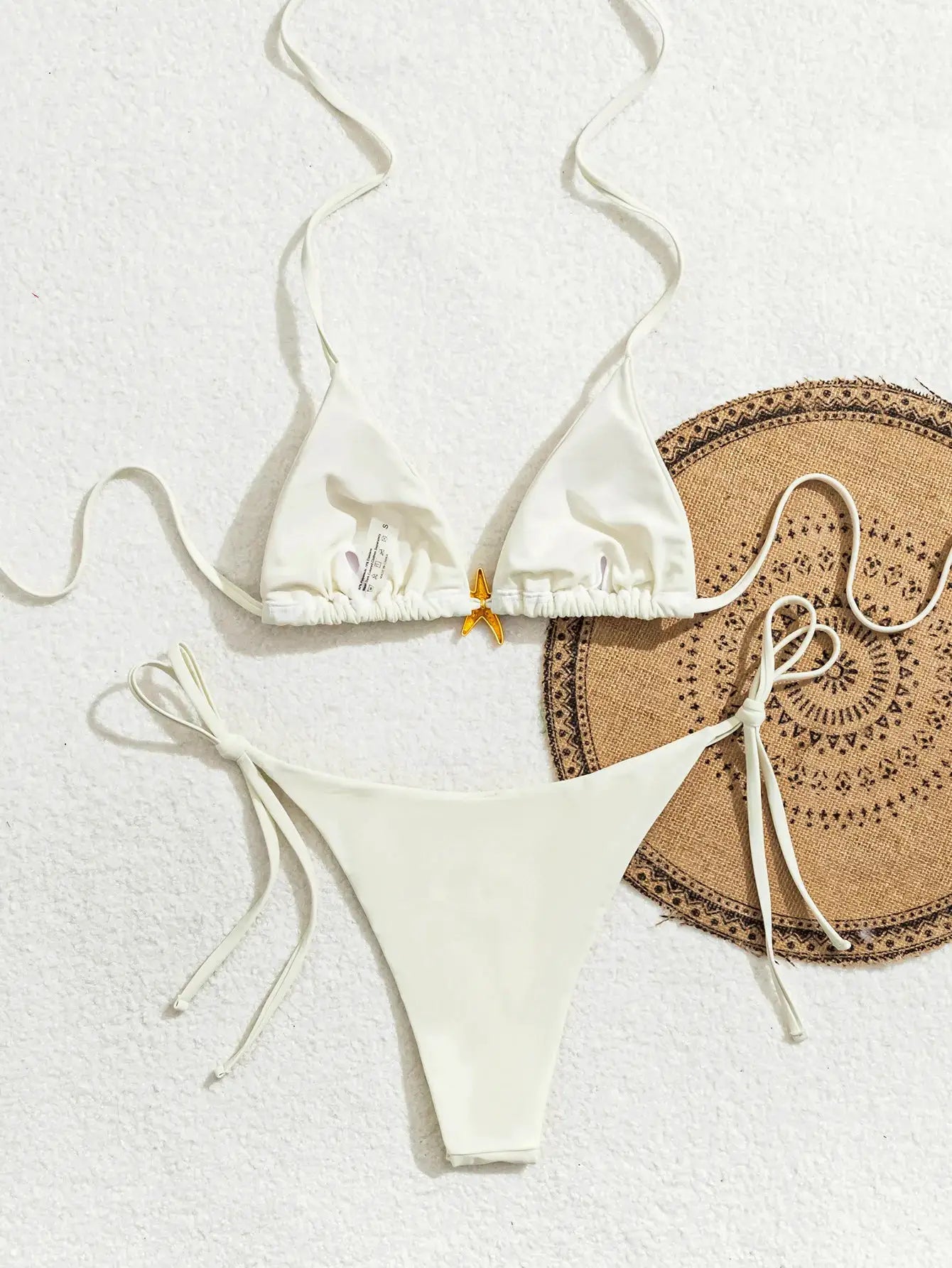 Simples Market two-piece white triangle bikini set with string ties and Brazilian bottoms, gold star charm.
