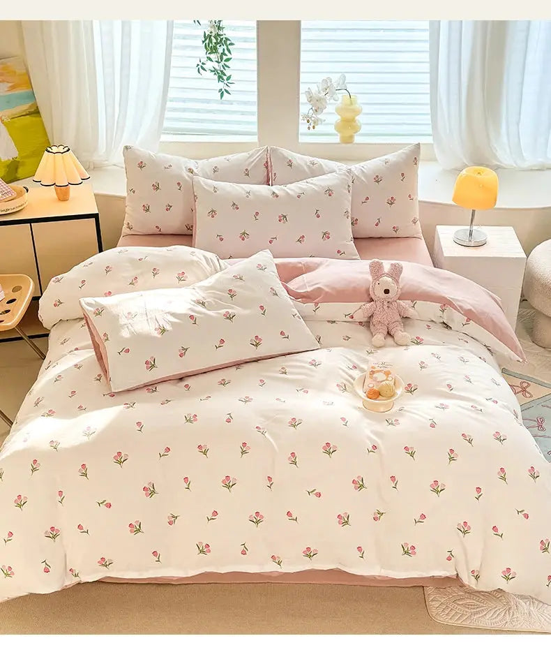 Tulip three-piece quilt cover and pillowcase set; two pillowcases and quilt cover in pink on white, student bedding