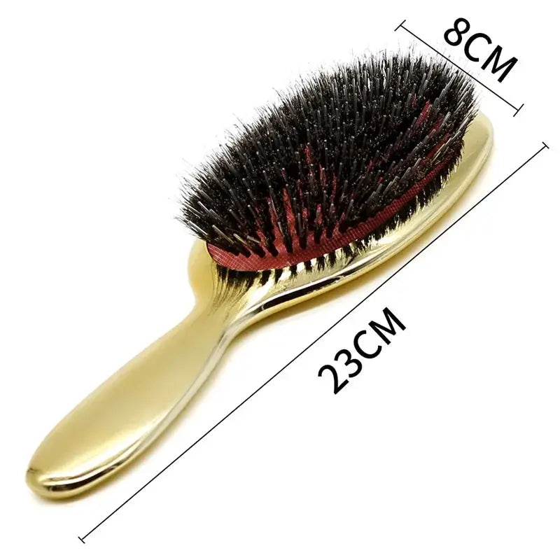Paddle hair brush with gold-tone handle and red cushion, black boar bristles, oval shape, anti-static, 23 cm long.