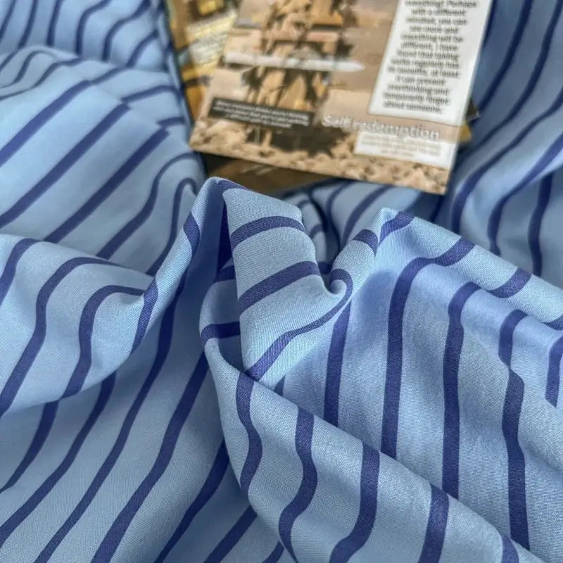Bedding set with blue striped duvet cover, pillowcases and bedsheet, Simples Market.