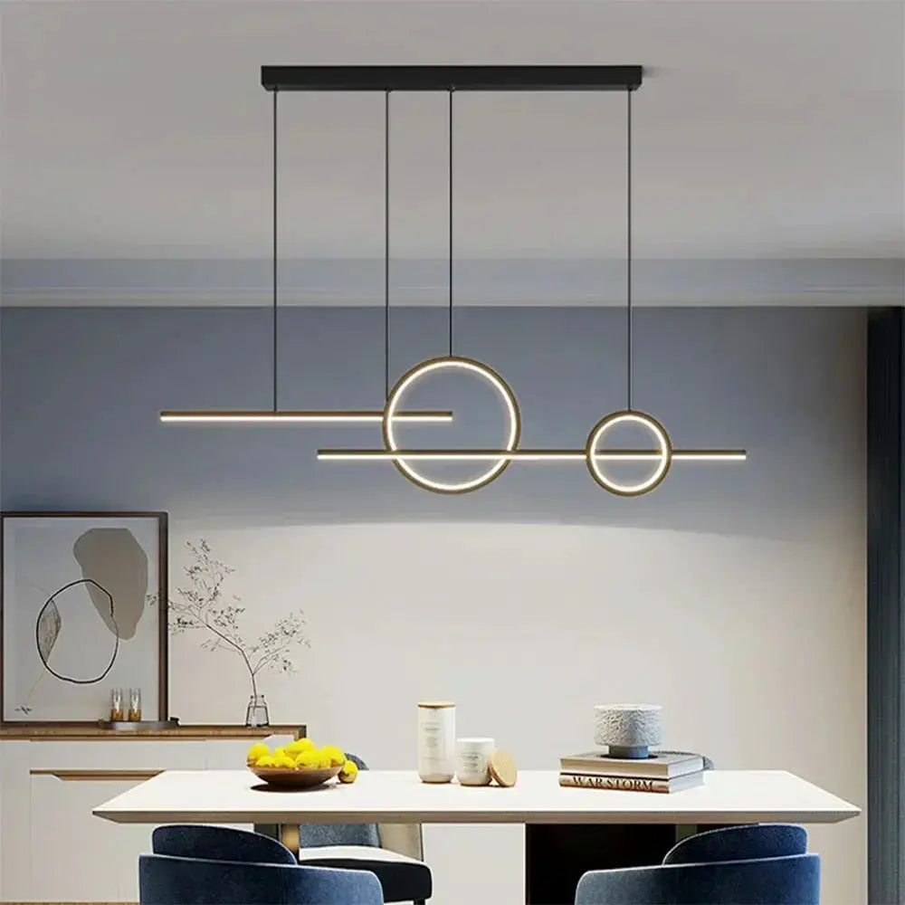 Modern LED pendant light by Simples Market; minimalist chandelier with circular rings and a horizontal bar, black.