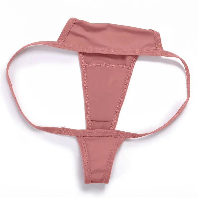 Pink low-rise thong underwear with T-back design and slim side straps.