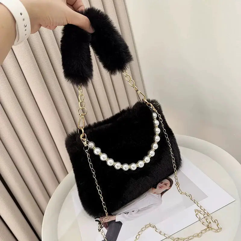 Rabbit fur handbag with pearl bead trim and gold chain crossbody strap, black by Simples Market