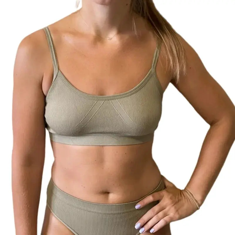 Two-piece seamless ribbed bralette and underwear set in olive; wireless, no pads.