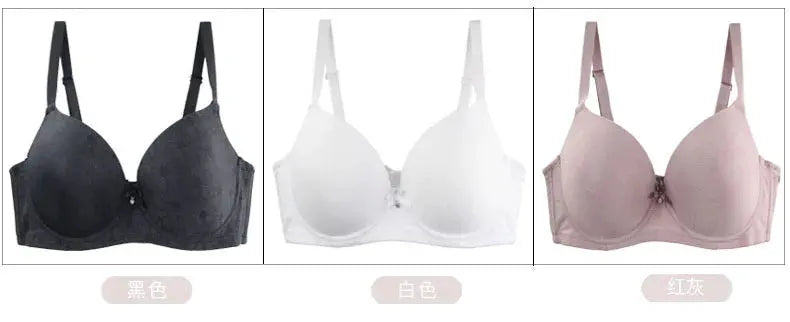 Three DaiNaFang lace bras set in black, white and burgundy with bow accents