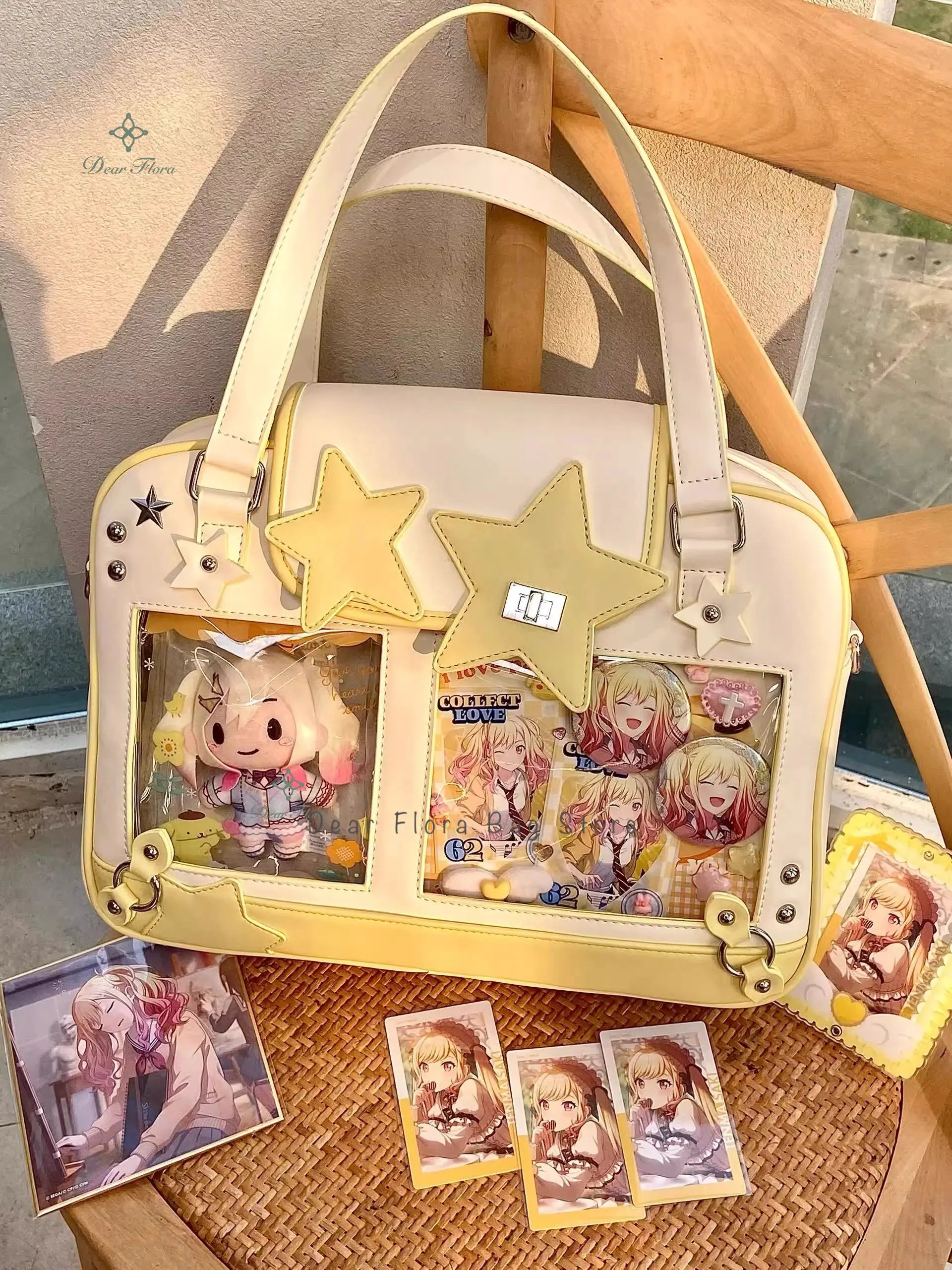Pastel cream star ita bag crossbody with transparent pockets showing anime cards