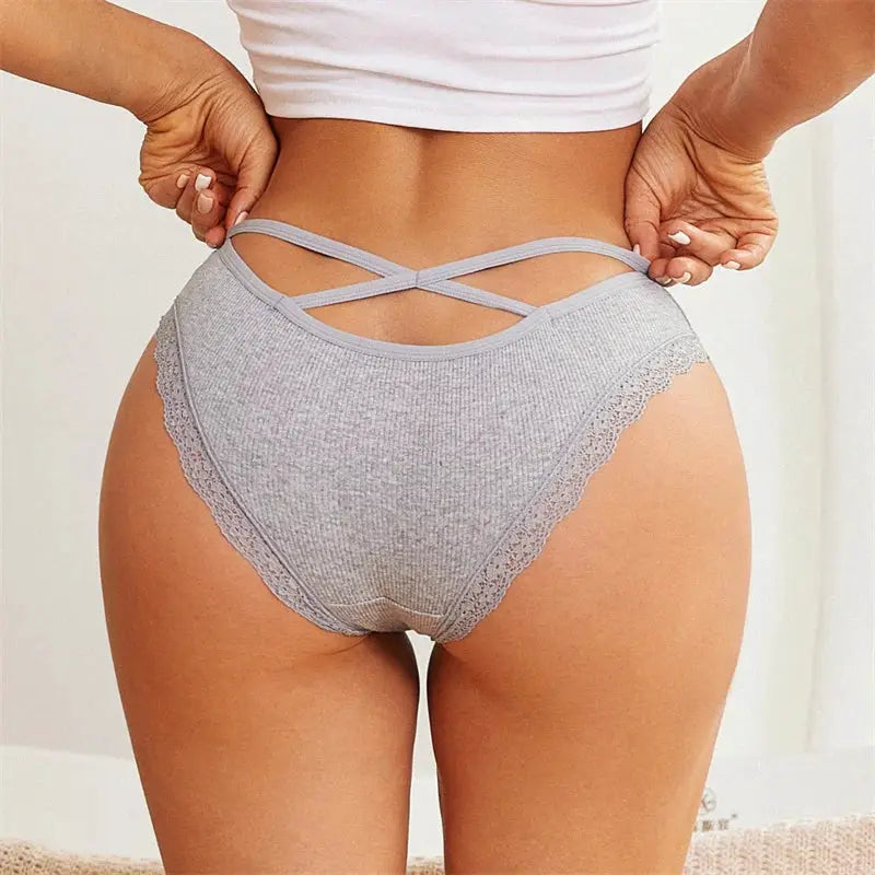 Women's gray cotton lace briefs with cross-back straps.