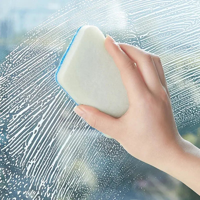Bathroom sponge cleaning brush with white foam pad and blue edge used on glass surfaces