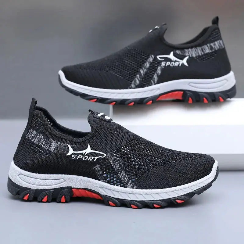 Men's black breathable mesh sport sneakers from Simples Market with white sole and red outsole accents.
