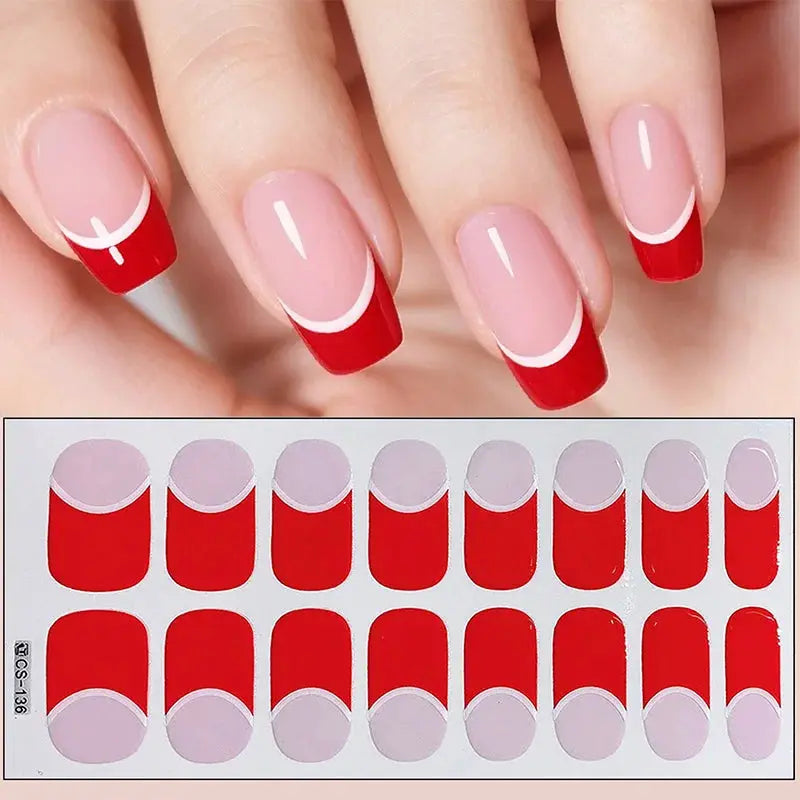 Full-cover nail stickers by Simples Market with red French tips and white arc accents on a pink base
