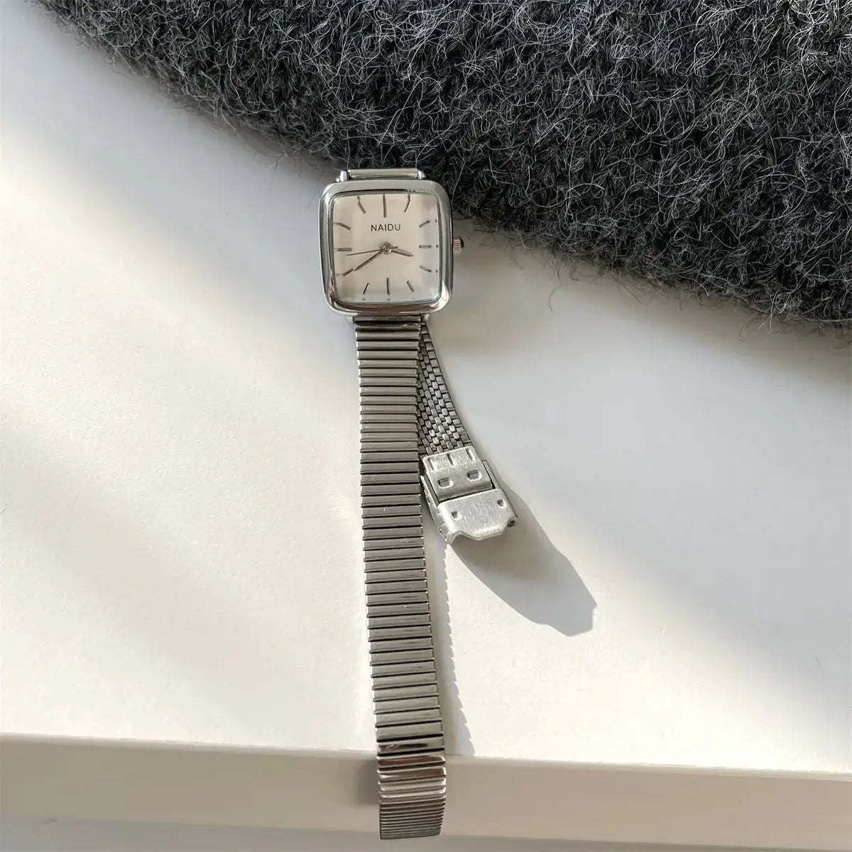 Women's square-dial quartz watch with silver-tone stainless steel bracelet and minimalist markers, NAIDU
