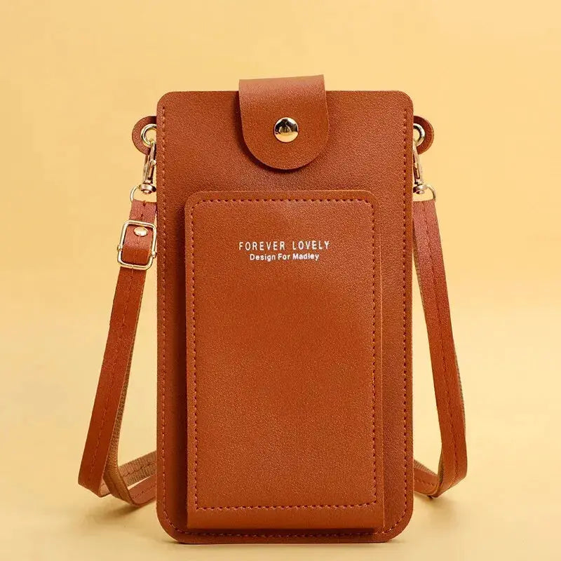 Women’s soft leather crossbody handbag in brown with front pocket by Forever Lovely