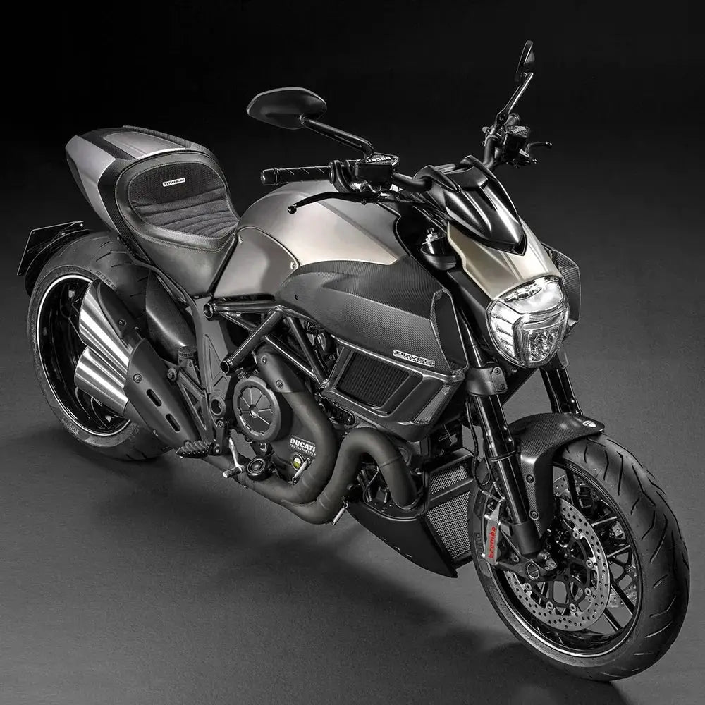 Simples Market black carbon fiber vinyl wrap film for Ducati motorcycle with air-release channels.