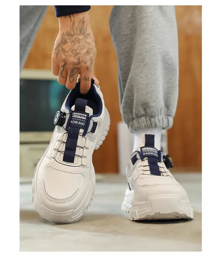 Men's chunky high-top sneakers with thick soles; white with navy accents, pair