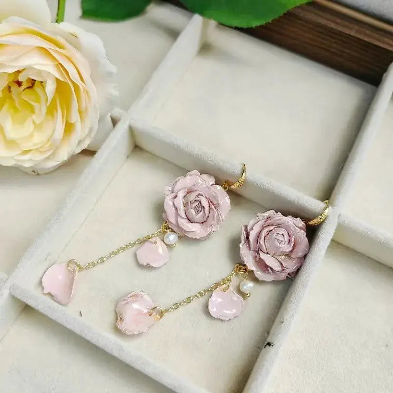 Elegant Immortal Rose Long Earrings pair by Simples Market, pink epoxy resin roses with dangling pearl accents