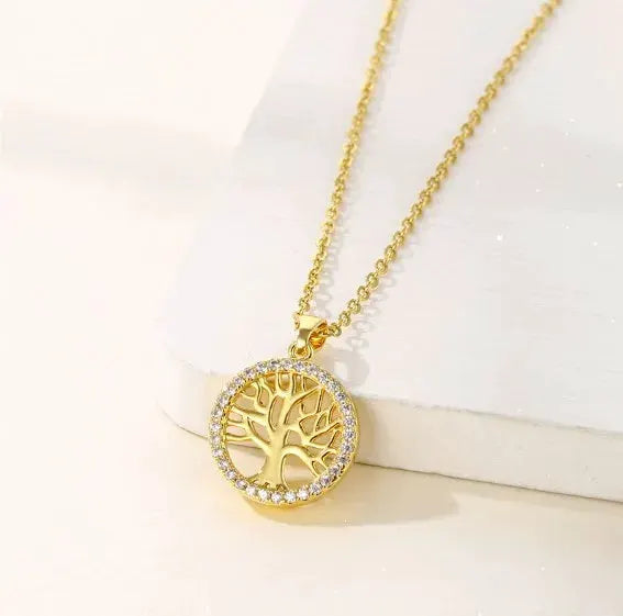 Tree of Life pendant necklace with gold-tone stainless steel chain and rhinestone border