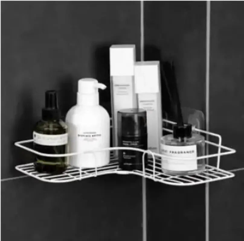 Triangle shelf, white, wall-mounted bathroom organizer, holding six bottles and jars