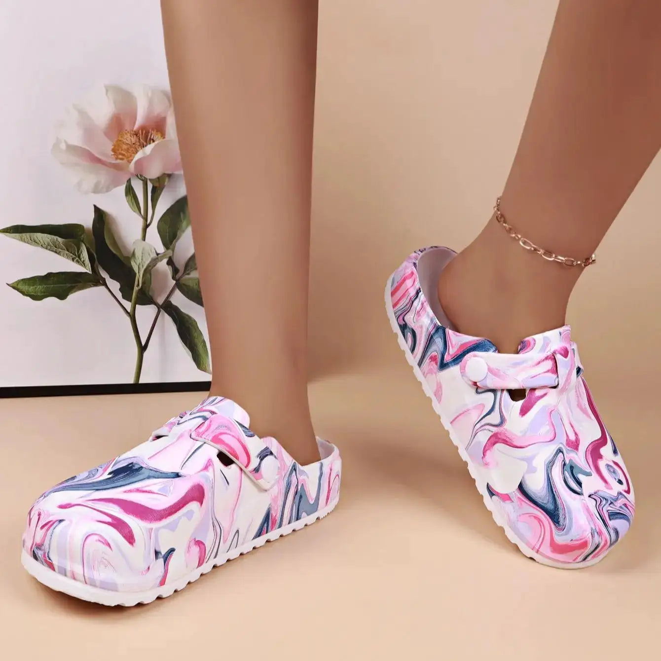 Women's garden clogs by Simples Market; colorful marble-pattern EVA slip-ons with a white sole