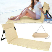 Outdoor foldable camping chair with beige Oxford cloth backrest cushion on the beach