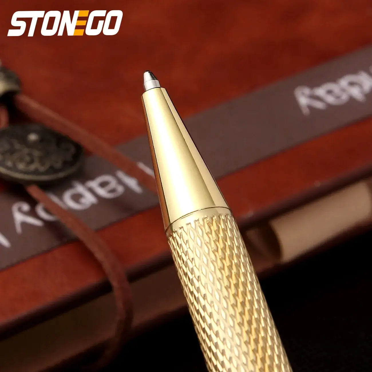 Ballpoint pen by Simples Market, gold-tone retractable with knurled grip