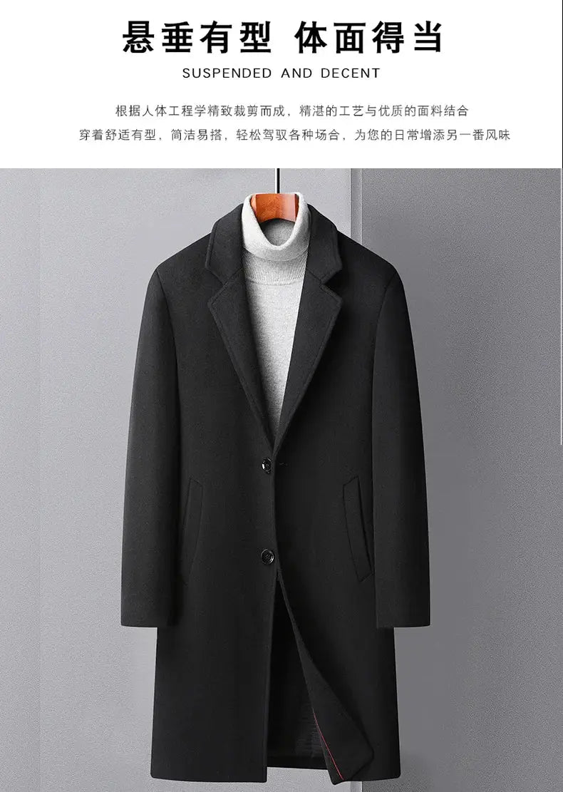 Men's black wool long coat with notch lapels and two-button front, shown over a light gray turtleneck.