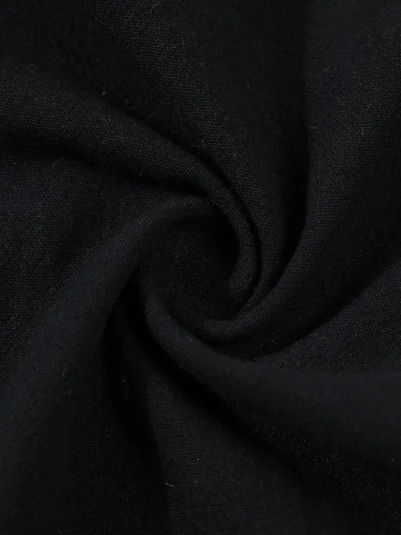 Black cotton-linen fabric swatch with soft woven texture