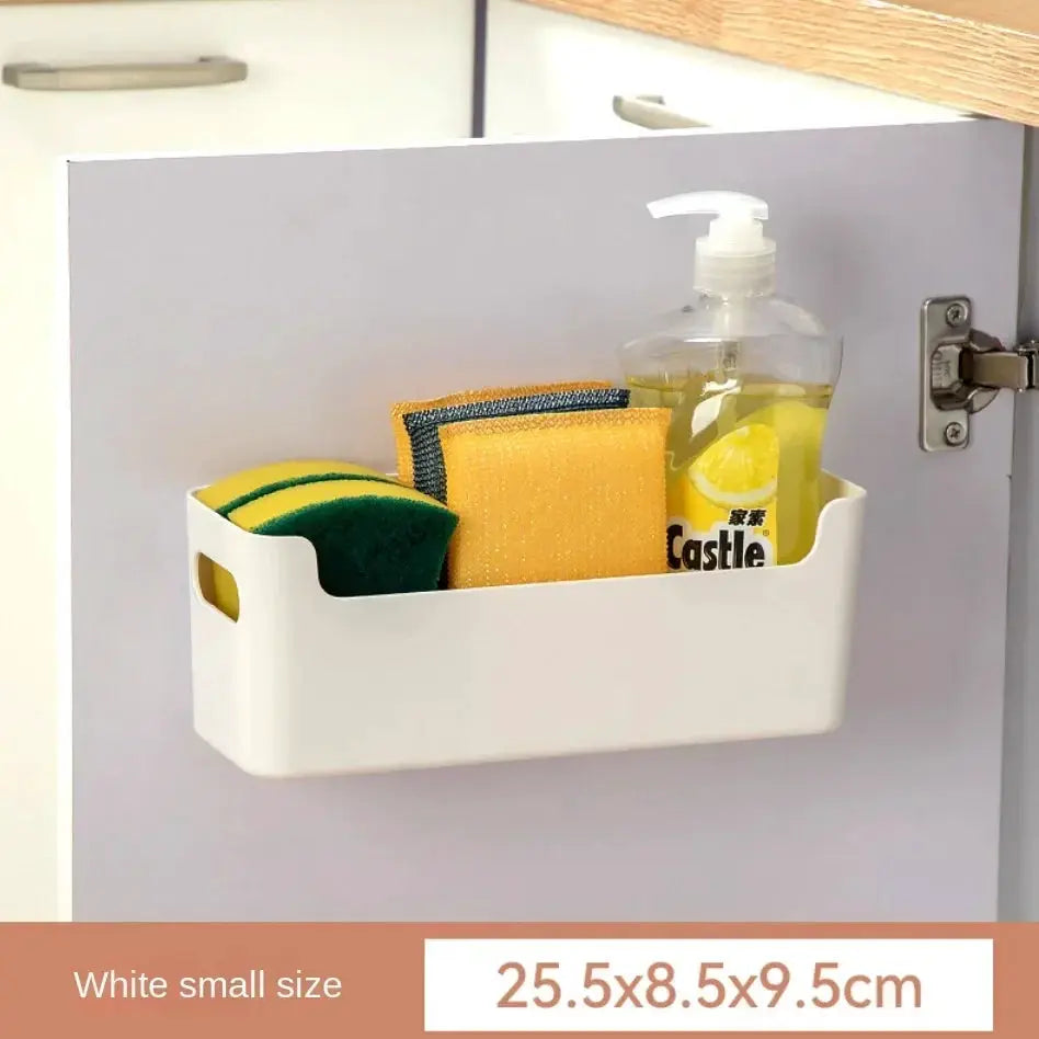 White non-perforated cabinet door rack with Castle dish soap, yellow sponge, and green scrub pad