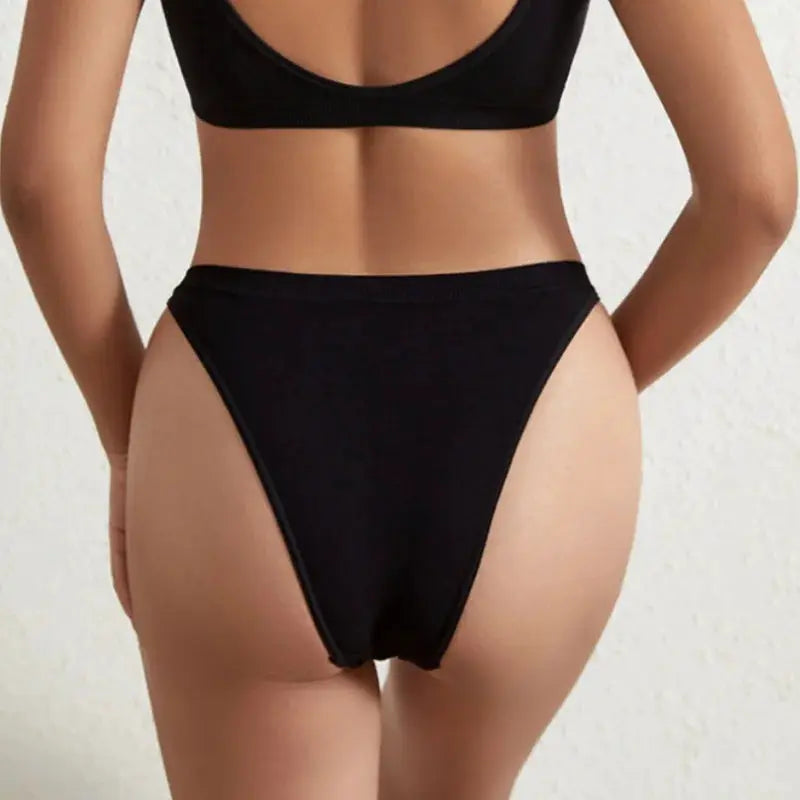 Women ribbed low-rise thong underwear in black with high-leg cut and breathable cotton gusset