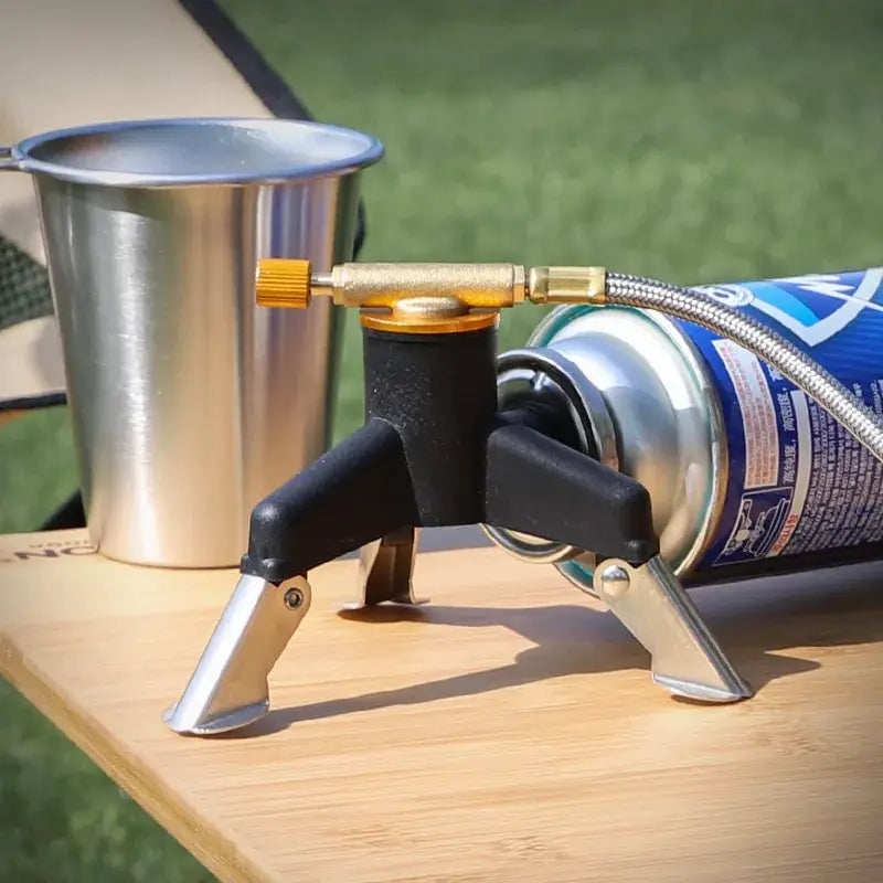 Camping gas stove adapter on a portable folding tank tripod stand, stainless steel