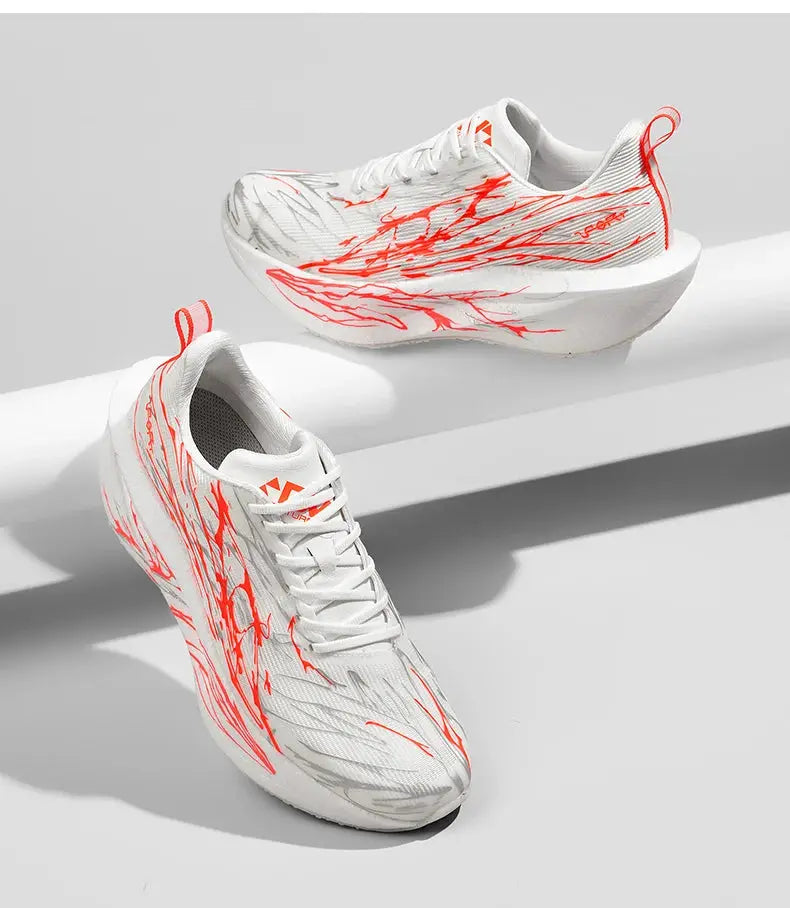 Pair of men's white running shoes with orange marbled pattern and breathable lightweight air cushion sole