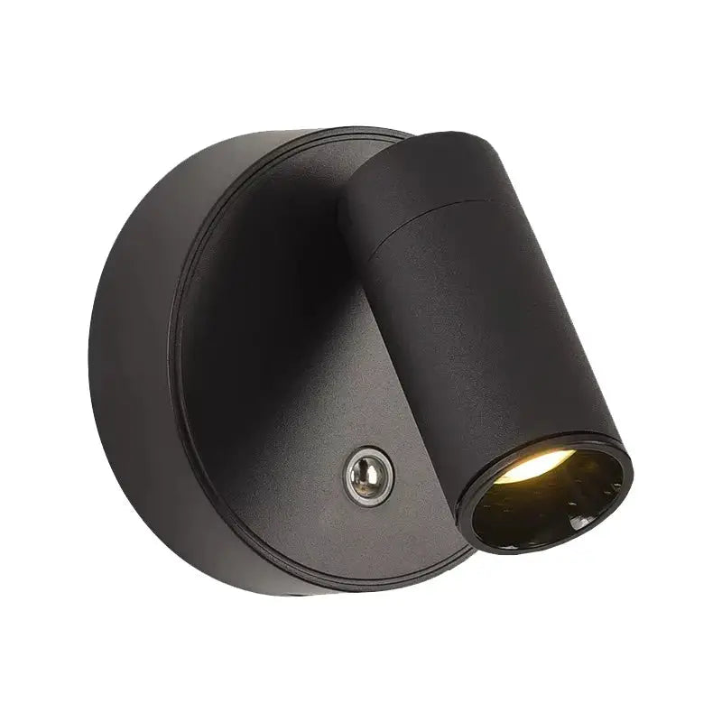 Rechargeable LED wall lamp by Simples Market, black cylindrical spotlight with 360° rotation and wall mount