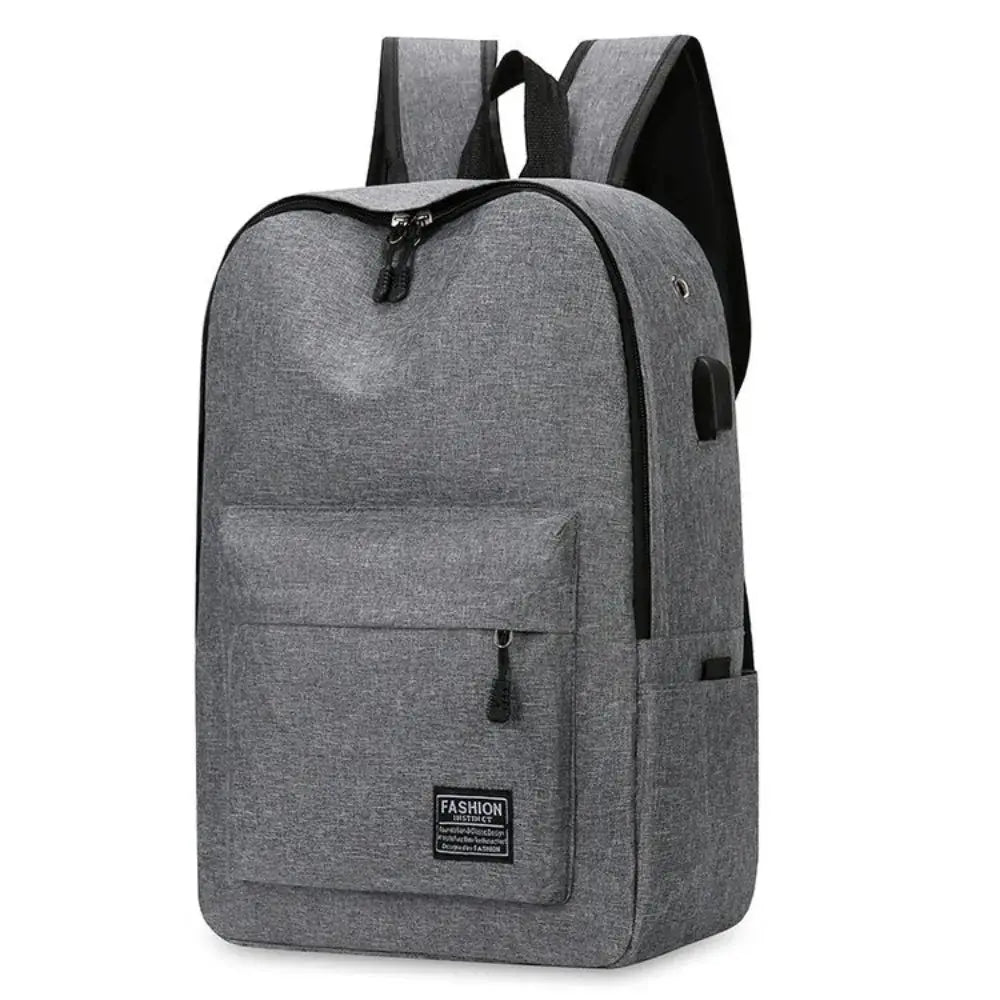 Simples Market gray minimalist backpack with large-capacity main compartment and front zip pocket.