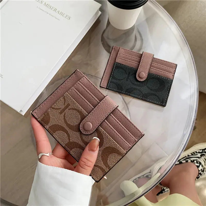 Two Simples Market monogram card holders, ultra-thin wallets in pink-brown and black-pink with snap strap