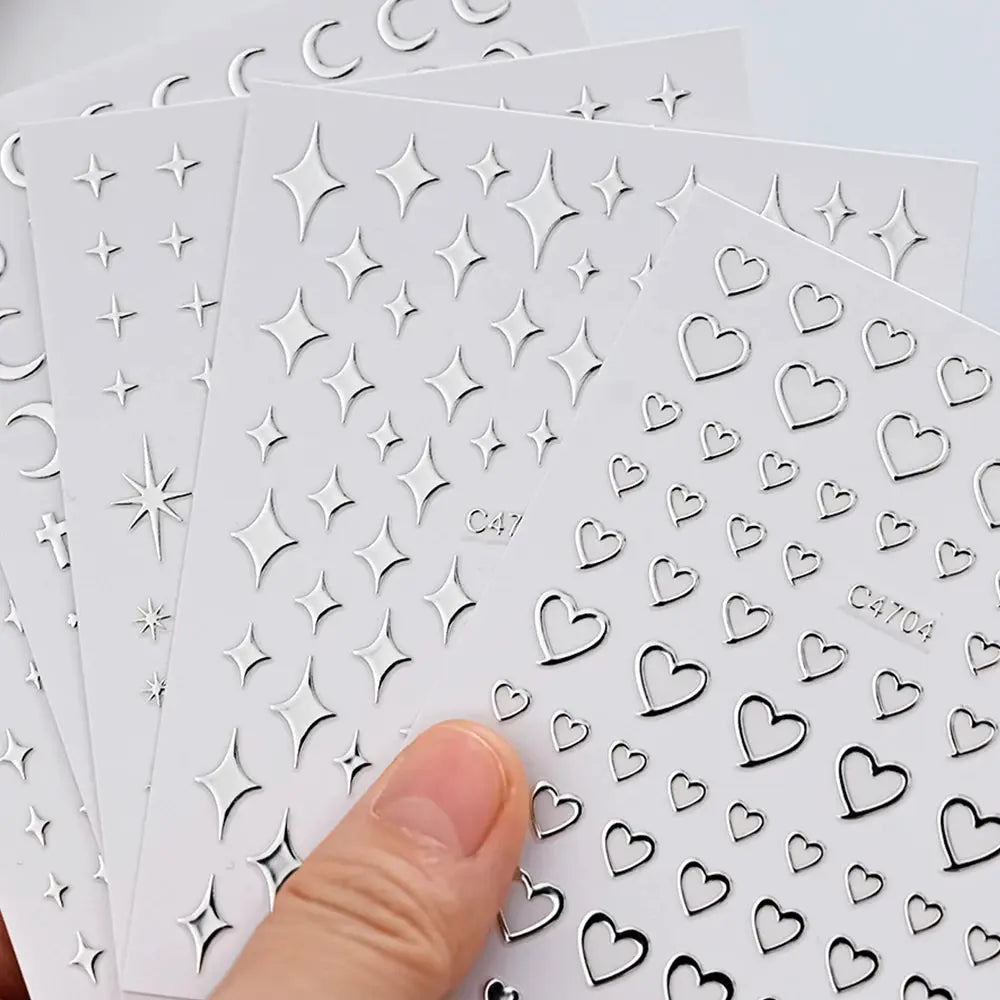 6 sheets metal silver nail stickers by Simples Market with 3D stars and hearts for nail art